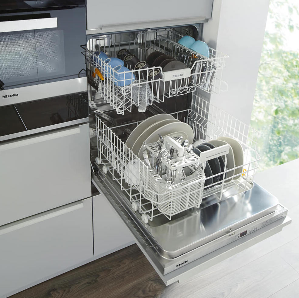 Dishwasher in tall cupboard